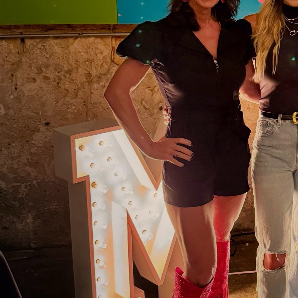 Stylish Women's Outfit with Red Fringe Boots